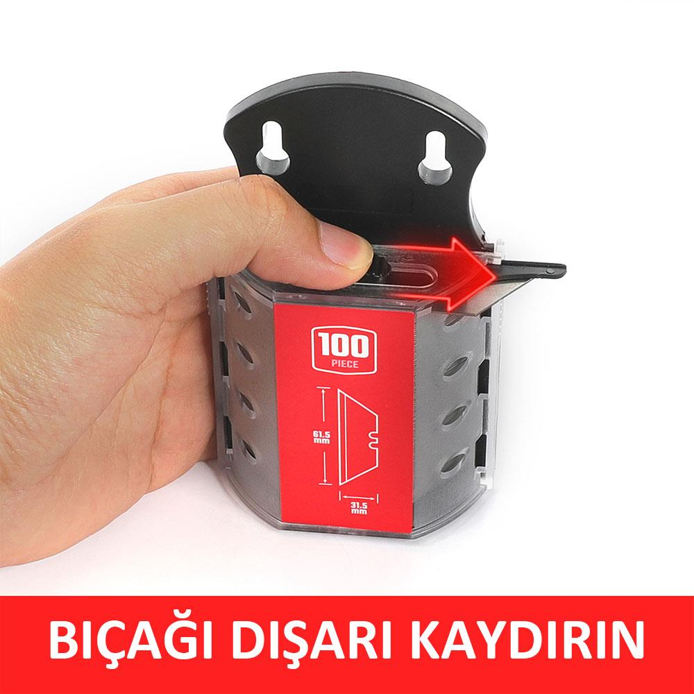 Bir başparmak, 100'lük bir bıçaklık dispenserinden bir bıçak çıkarıyor.