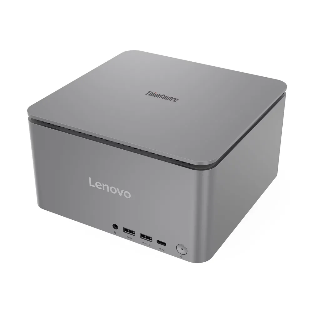 USB bağlantı noktalarına ve güç düğmesine sahip gri Lenovo ThinkCentre mini PC.