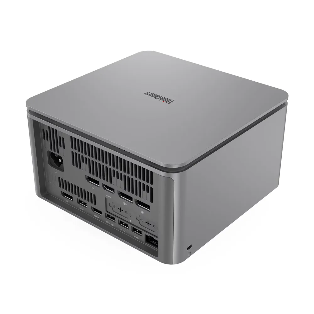 Arkada birçok bağlantı noktasına sahip gri mini PC. ThinkCentre.
