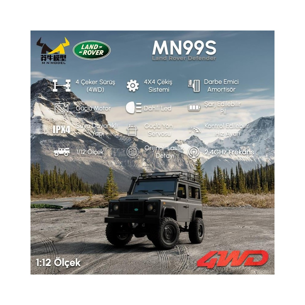 Gri renkli, 1:12 ölçekli uzaktan kumandalı Land Rover Defender, dağların önünde çakıl üzerinde duruyor.