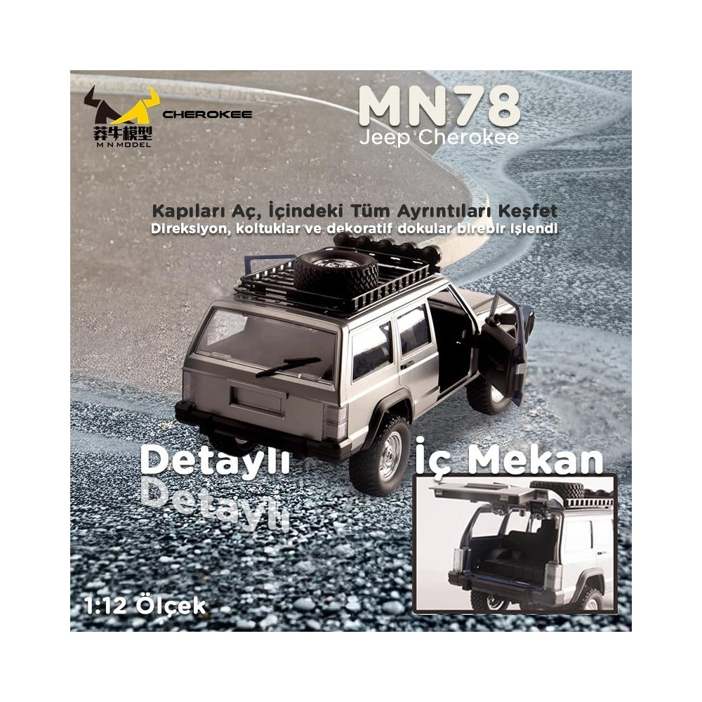Açık kapılı ve portbagajlı gümüş renkli Jeep Cherokee model araba.