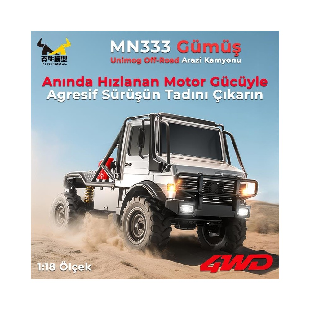 Gümüş renkli Unimog uzaktan kumandalı kamyon arazide toz kaldırarak ilerliyor.
