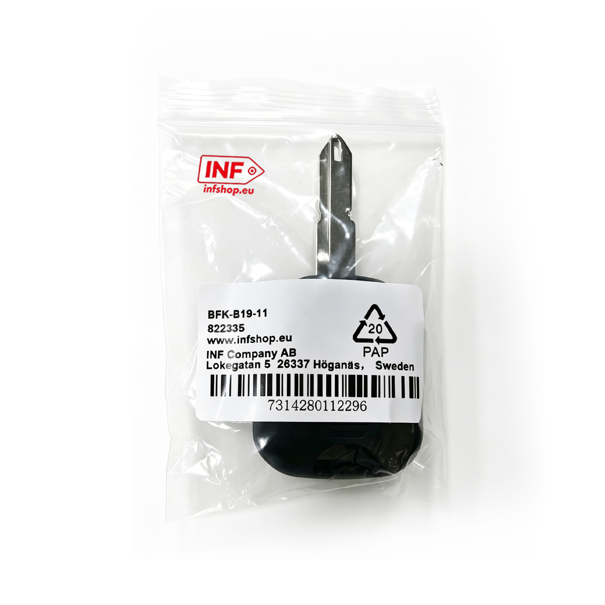 Ein Autoschlüssel mit schwarzem Griff und Metallschaft in Plastikverpackung.