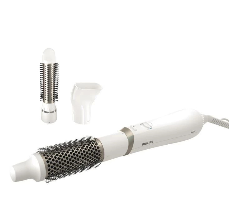 Un asciugacapelli Philips bianco con tre accessori su sfondo bianco.