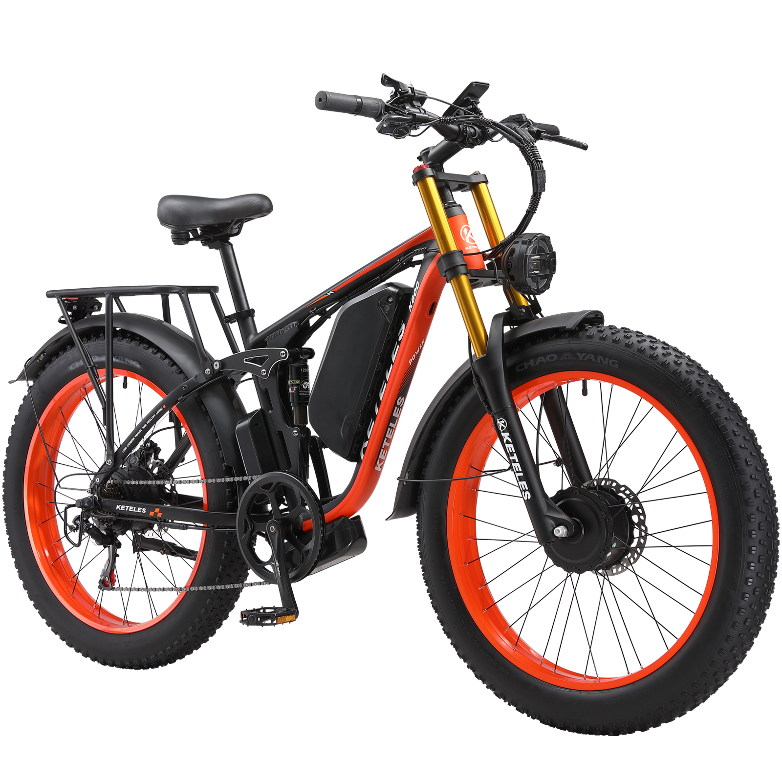 Pomarańczowy rower elektryczny typu fat bike z czarną ramą.
