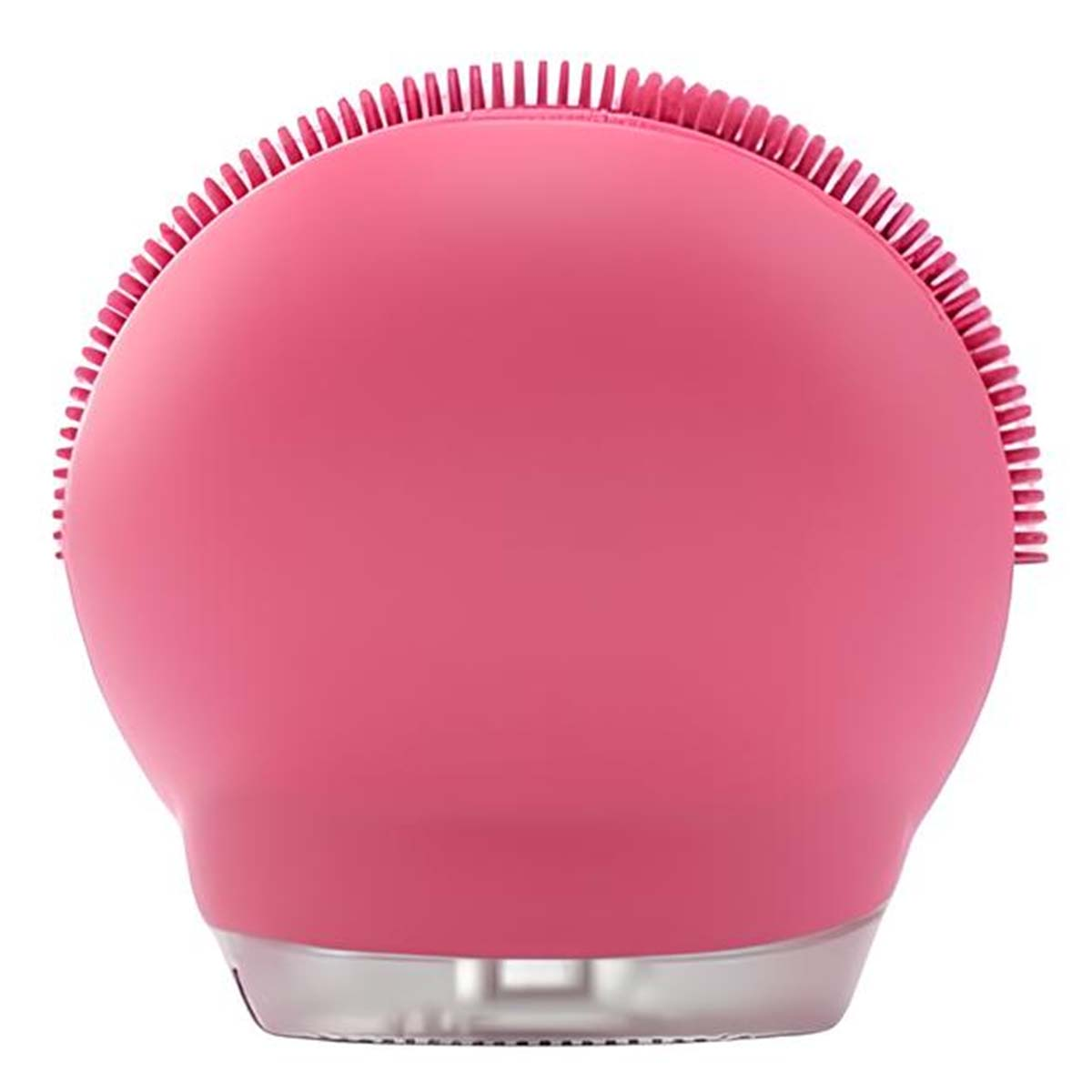 Ein pinker Gesichtsreiniger mit einer silikonbürste und einem durchsichtigen Boden.