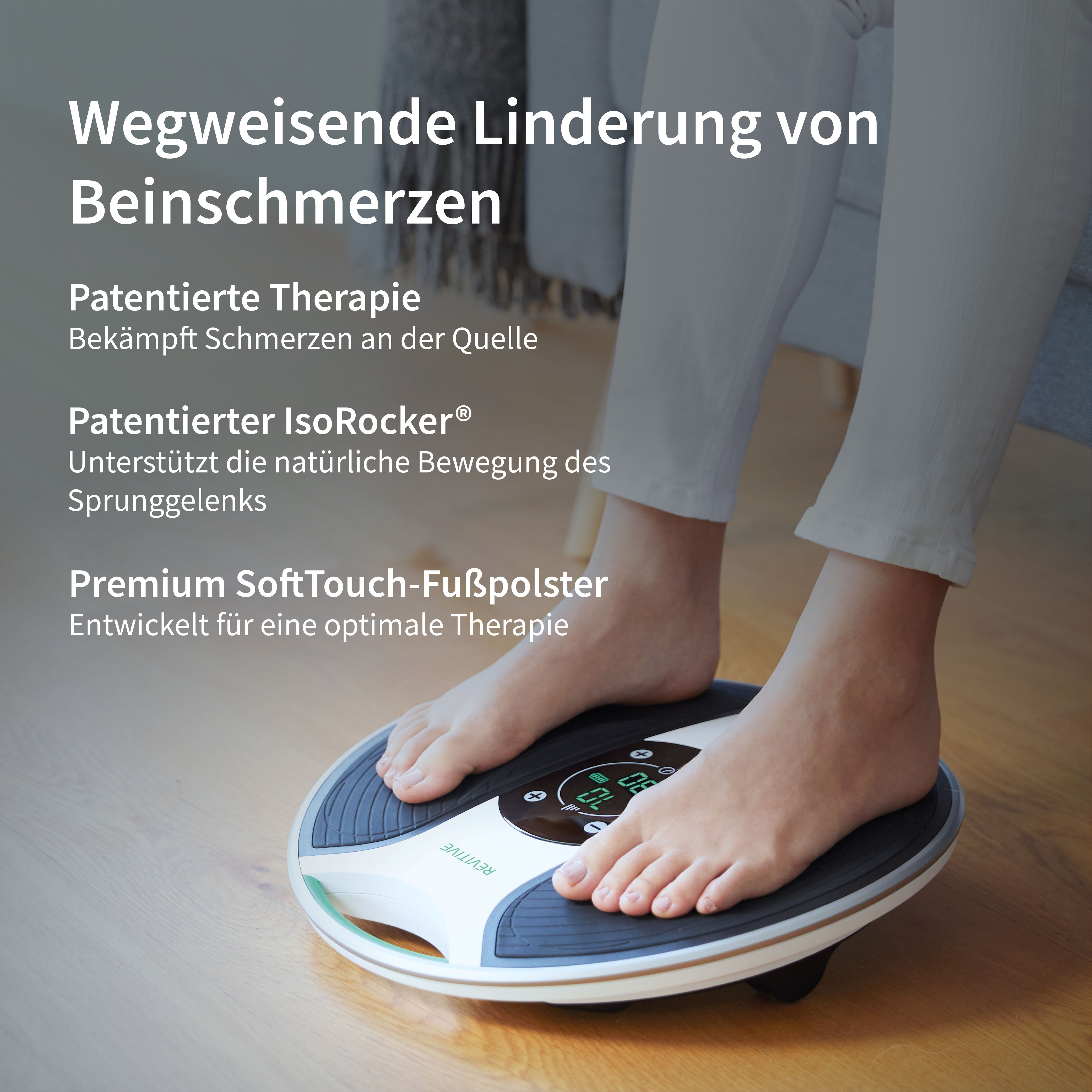 Füße auf einem Vibrationsgerät zur Schmerzlinderung. Der Bildschirm zeigt 
