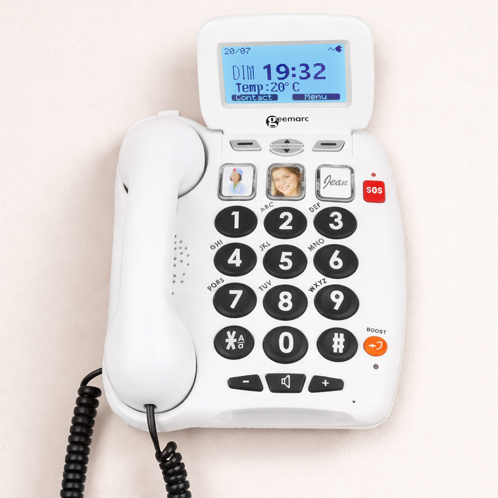 Ein weißes Schnurtelefon mit großem Display und nummerischer Tastatur.