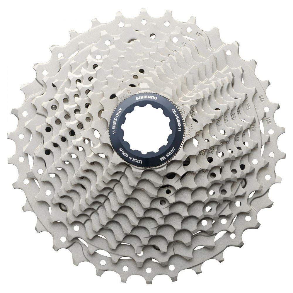Ein silberner Fahrradkassettenzahnkranz mit elf Gängen, Marke Shimano.