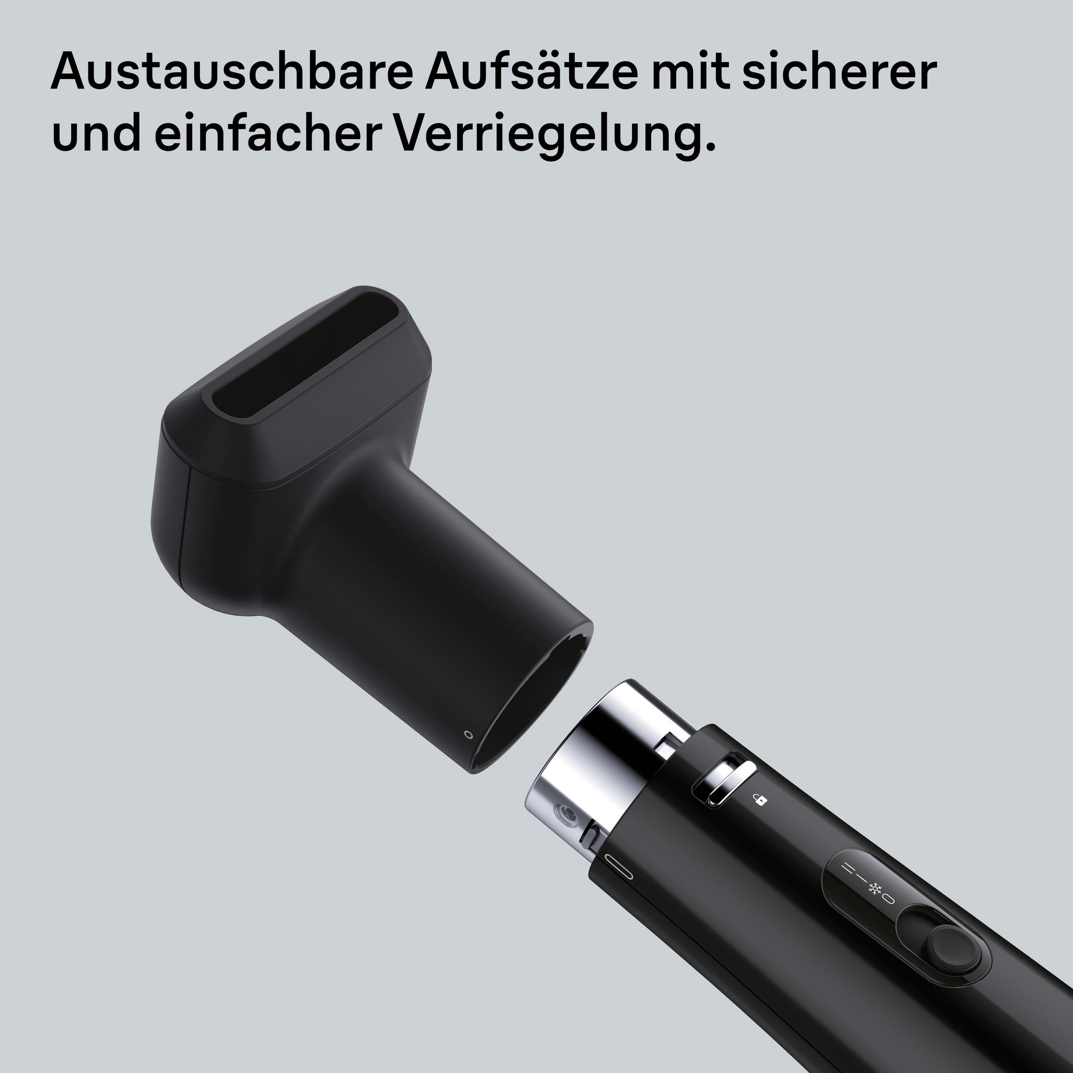 Schwarzer Haartrockner-Aufsatz wird am Hauptteil befestigt.