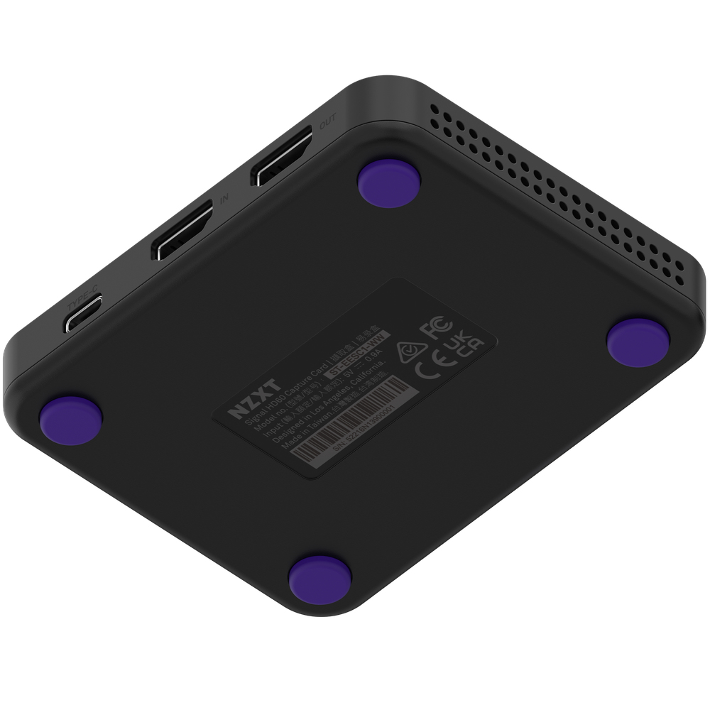 Scheda di acquisizione NZXT nera con piedini viola, porte HDMI e USB-C.