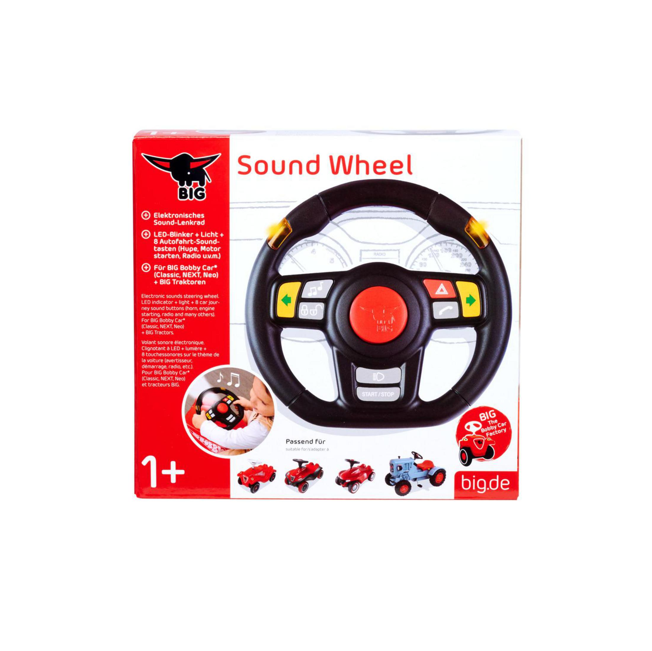 Verpackung eines BIG Sound-Lenkrads mit Lichtern, Tasten und kleineren Fahrzeugmodellen.