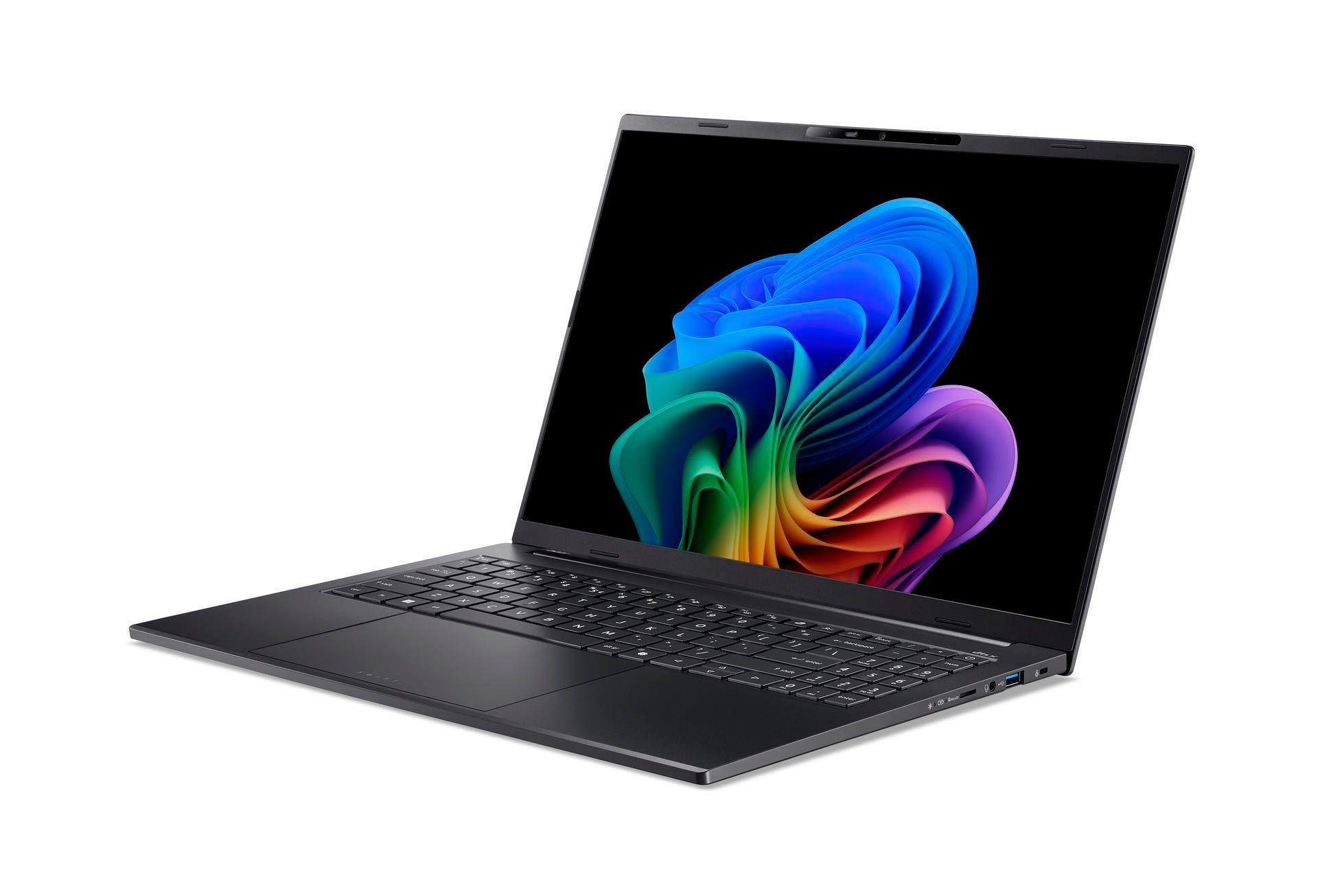 Ein geschlossener schwarzer Laptop mit einem bunten Hintergrundbild auf dem Bildschirm.