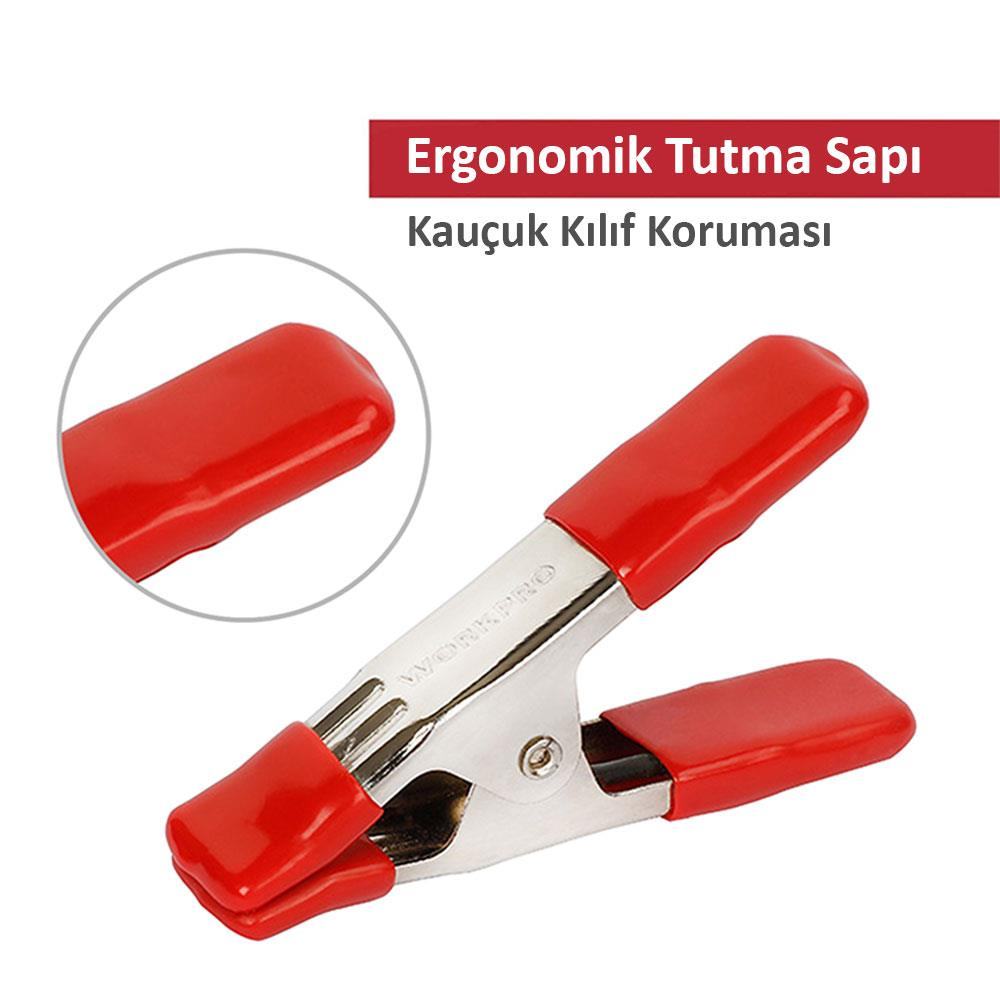 Metal çeneli ve lastik tutamaklı kırmızı yaylı mandal, beyaz zeminde.