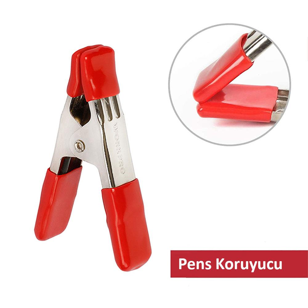 Metal ve plastik kırmızı yaylı kelepçe, detaylı çekim.