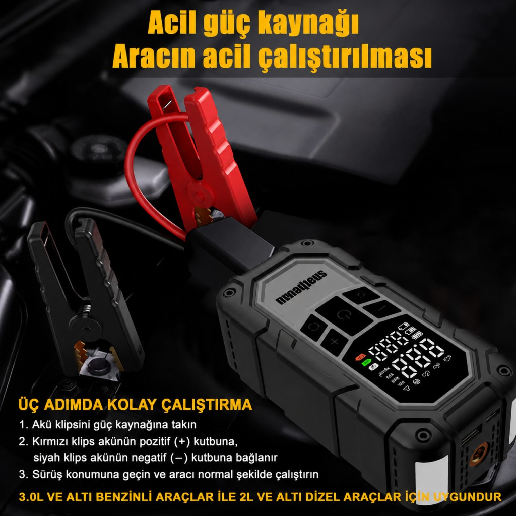 Kırmızı ve siyah kelepçeli taşınabilir araç akü takviye cihazı motor bölmesine takılı.