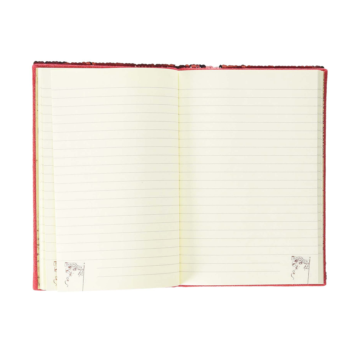Ein rotes Notizbuch mit linierten Seiten und Glitzer am Einband.