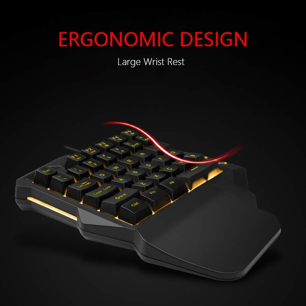 Ergonomische Tastatur mit gelber Hintergrundbeleuchtung und großer Handballenauflage.