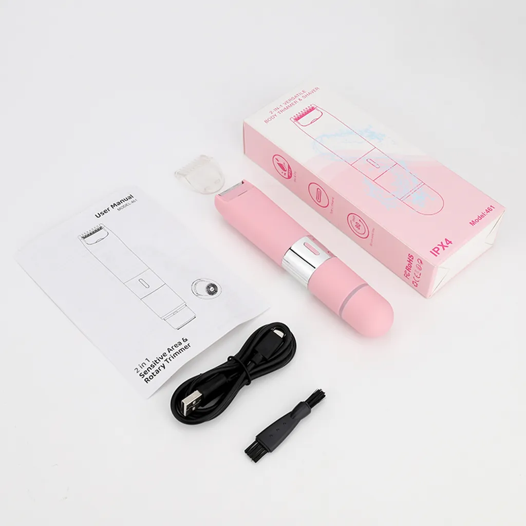 Pinker Körpertrimmer, Anleitung, USB-Kabel, Bürste und Karton auf weißem Hintergrund.