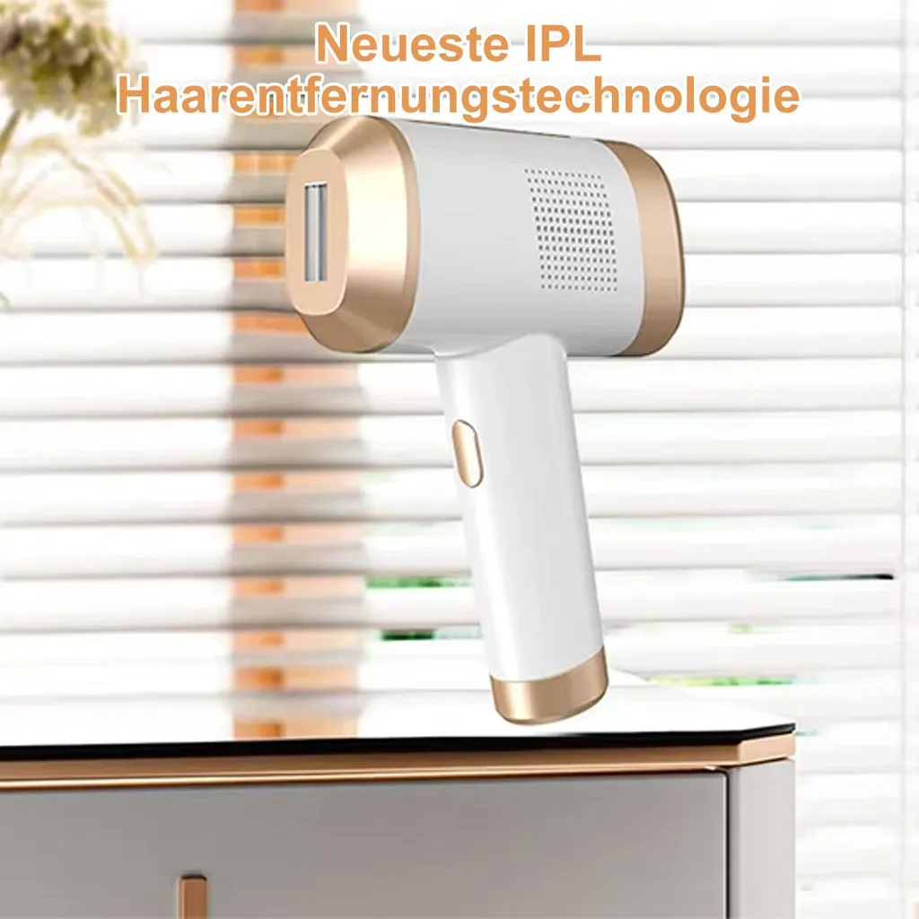 Ein weißer und goldener IPL-Haarentferner liegt auf einem Tisch.