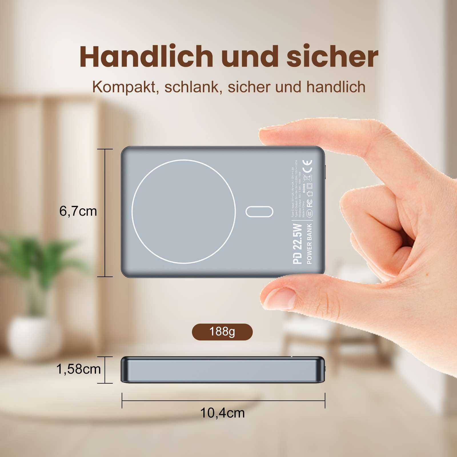 Grauer Powerbank mit Maßen 10,4x6,7x1,58cm, 188g, von Hand gehalten.