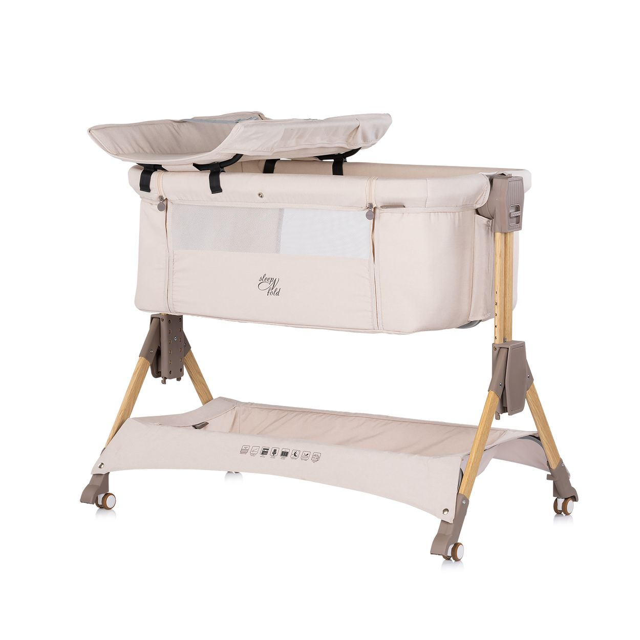 Eine beige Babywiege mit Wickelauflage oben und Ablagefach unten.