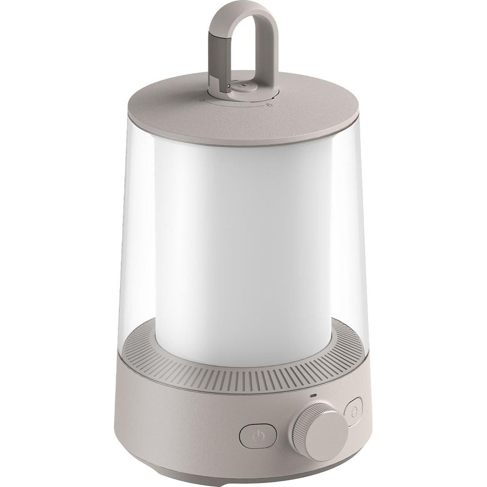 Una lámpara cilíndrica gris con carcasa transparente, luz blanca y asa.