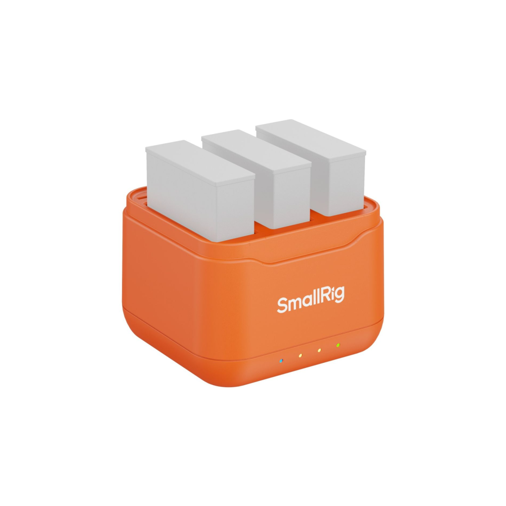 Oranje SmallRig oplader met drie witte batterijen erin. Indicatielampjes onderaan.