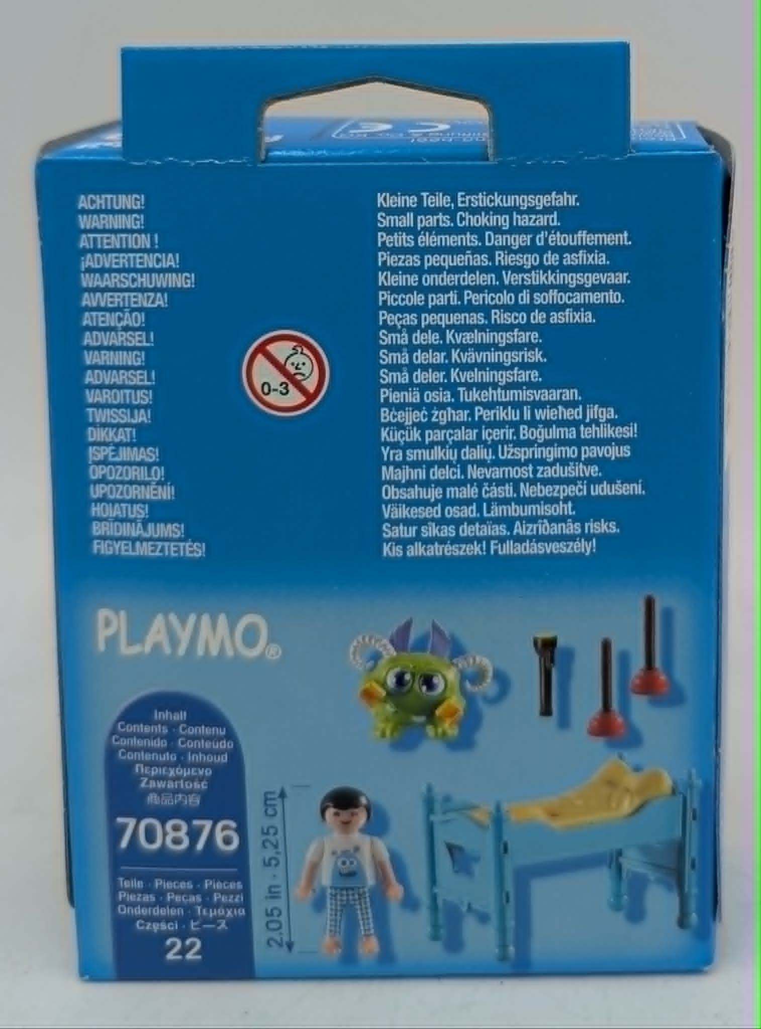 Embalaje de Playmobil con advertencias, figuras y accesorios.