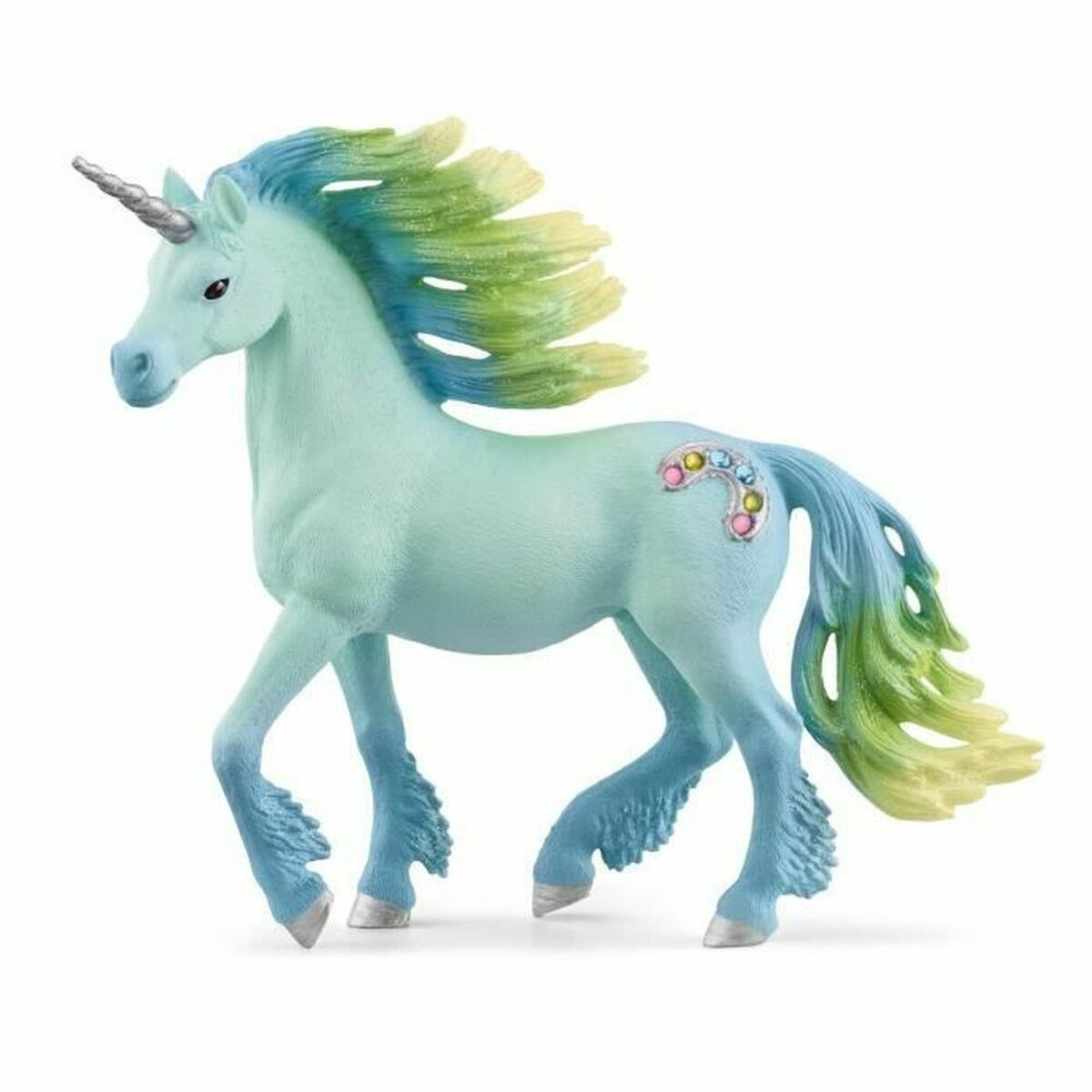 Un juguete de unicornio azul claro con cuerno plateado, crin y cola arcoíris.