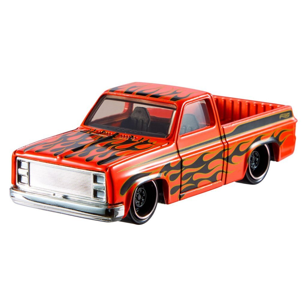 Roter Pickup-Spielzeugtruck mit schwarzen Flammen-Aufklebern und Chromgrill.