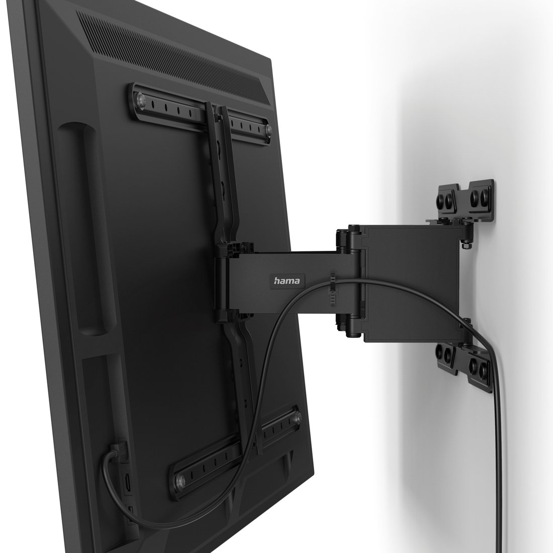 Eine schwarze TV-Halterung hält einen Flachbildfernseher an einer weißen Wand.