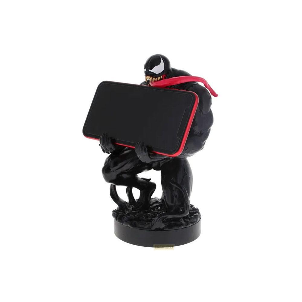 Statua nera di Venom che tiene uno smartphone con bordo rosso.