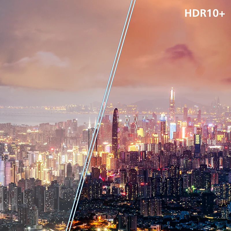 Miasto nocą, z wieloma światłami i logo HDR10+.