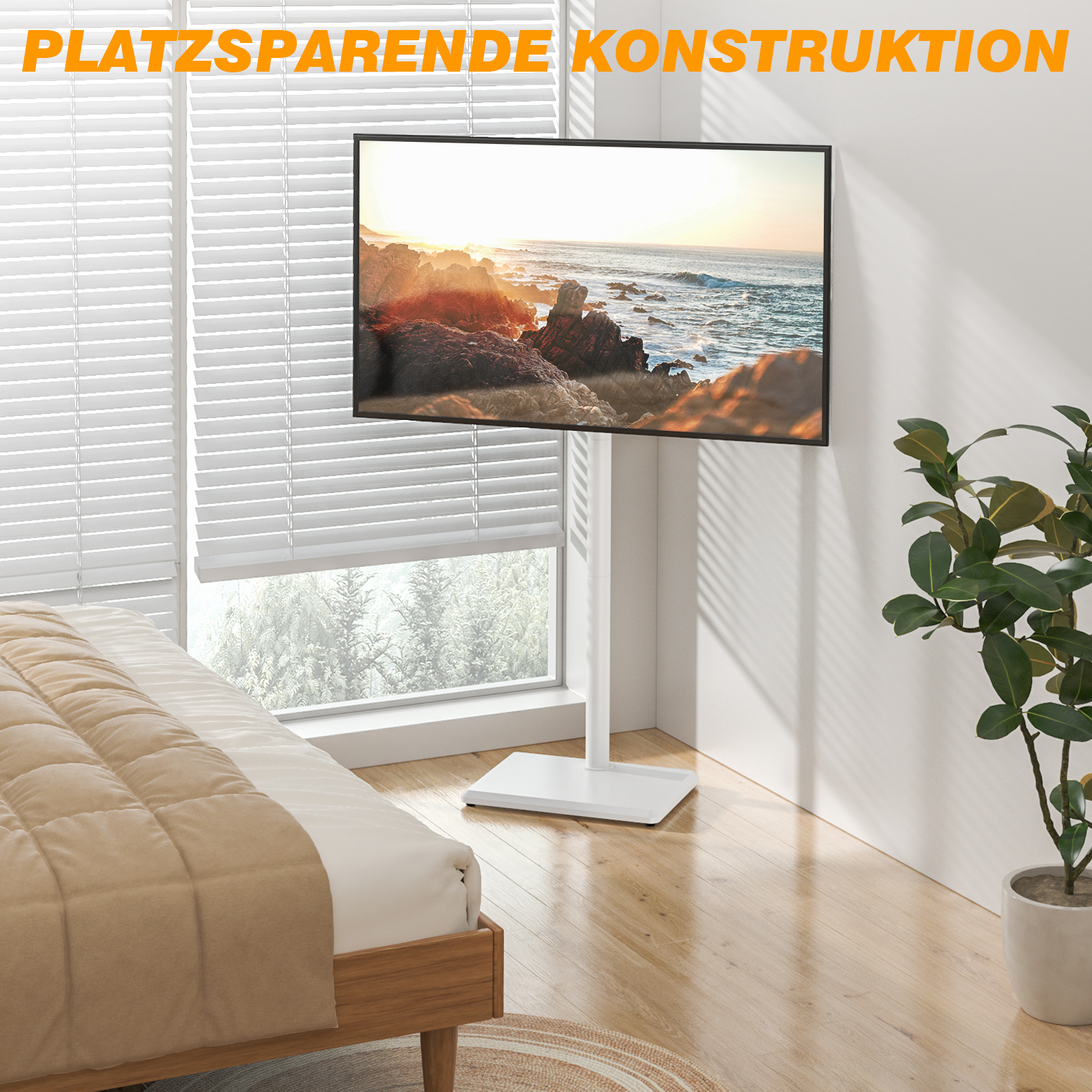 Ein moderner weißer TV-Ständer steht neben einem Bett mit Blick auf das Meer.