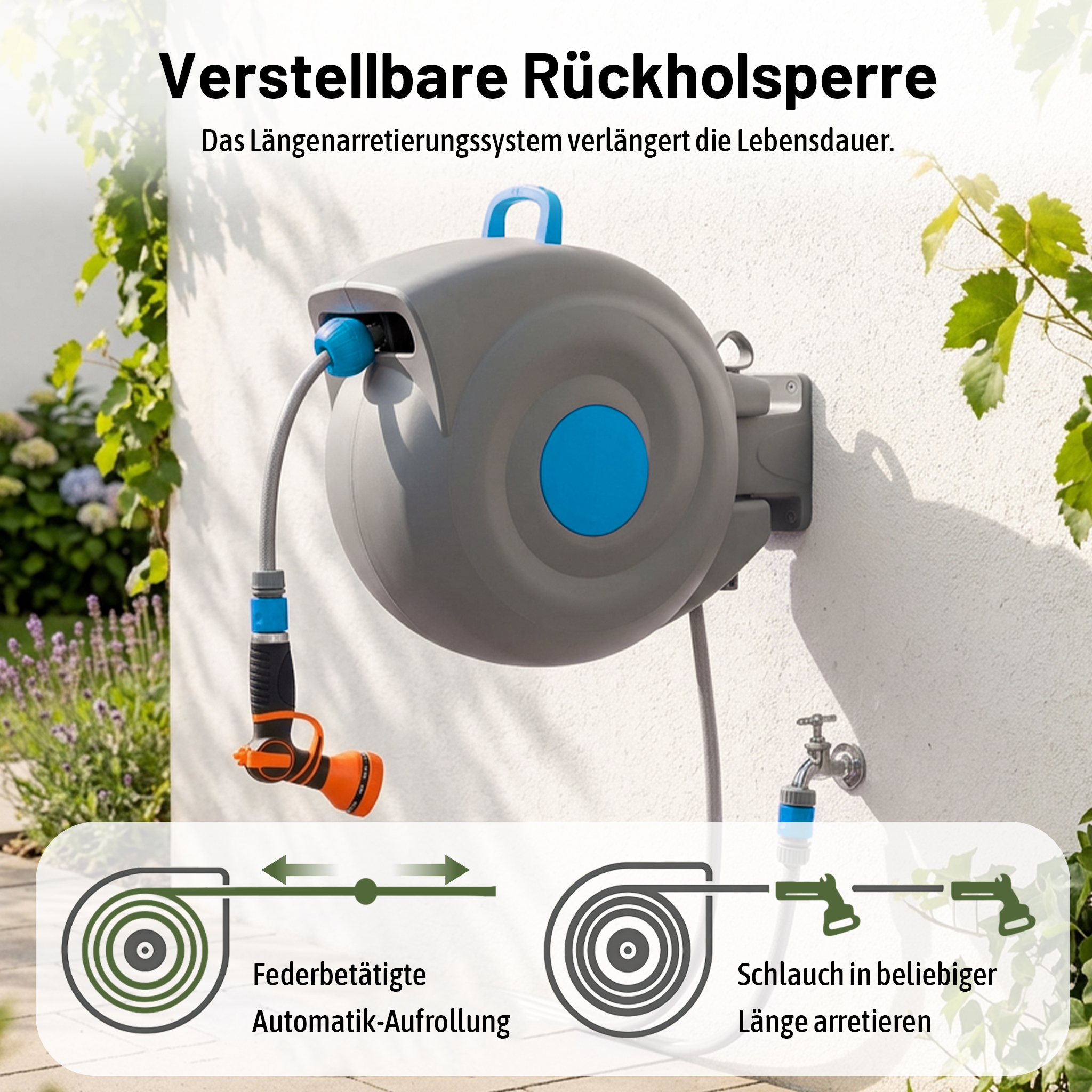 Graue Wand-Schlauchbox mit blauem Griff, daneben ein Wasserhahn und Pflanzen.