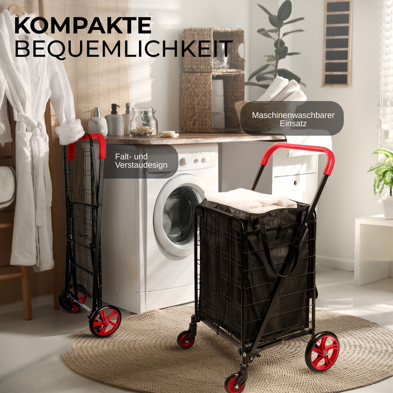 Zwei schwarze Einkaufswagen mit roten Akzenten vor einer Waschmaschine.