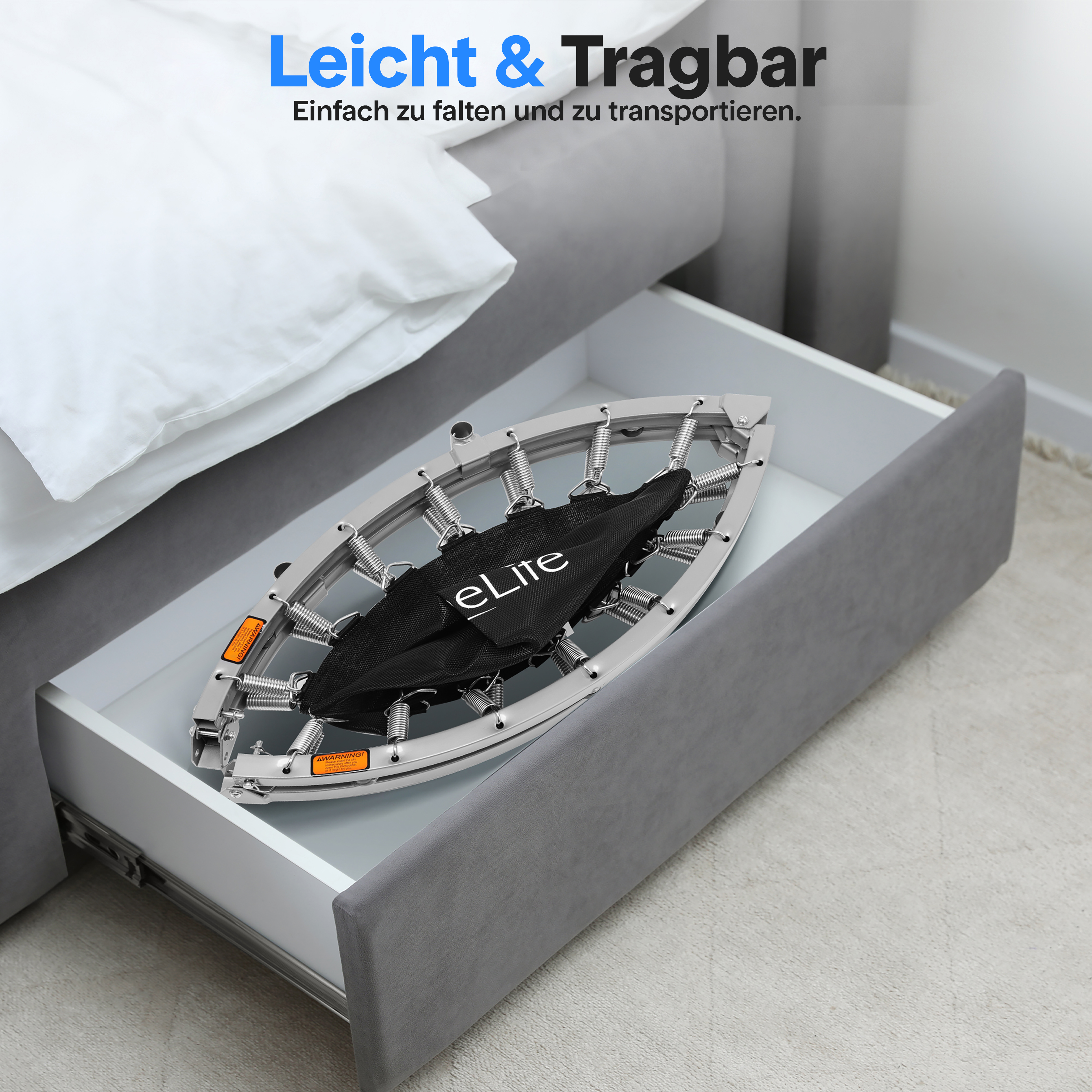 Gefalteter Trampolin in einer Schublade, neben einem Bett.