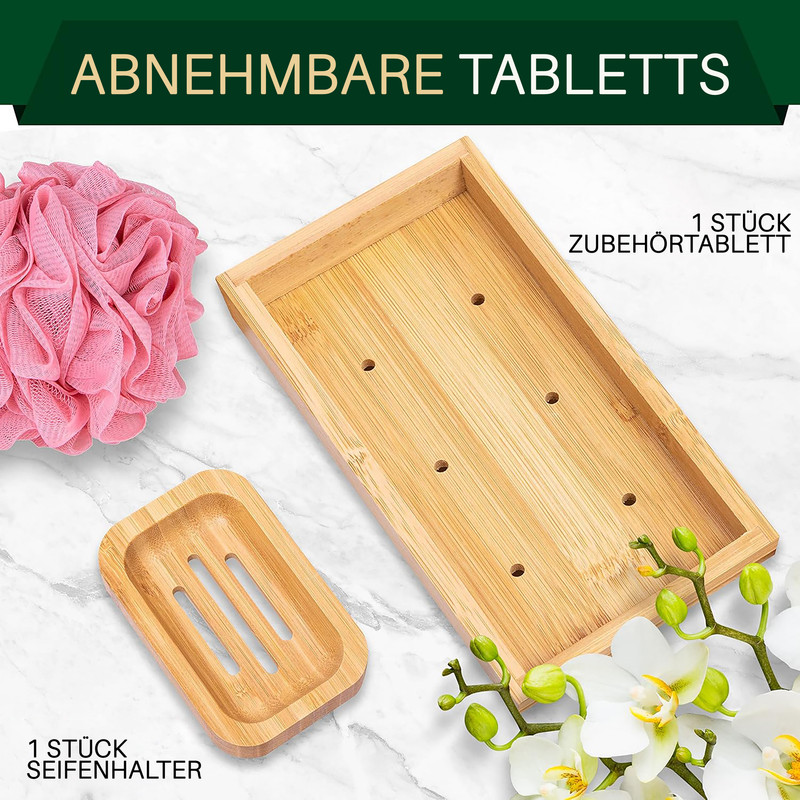 Ein rosa Duschschwamm, ein hölzerner Seifenhalter und ein Holzzubehörtablett.