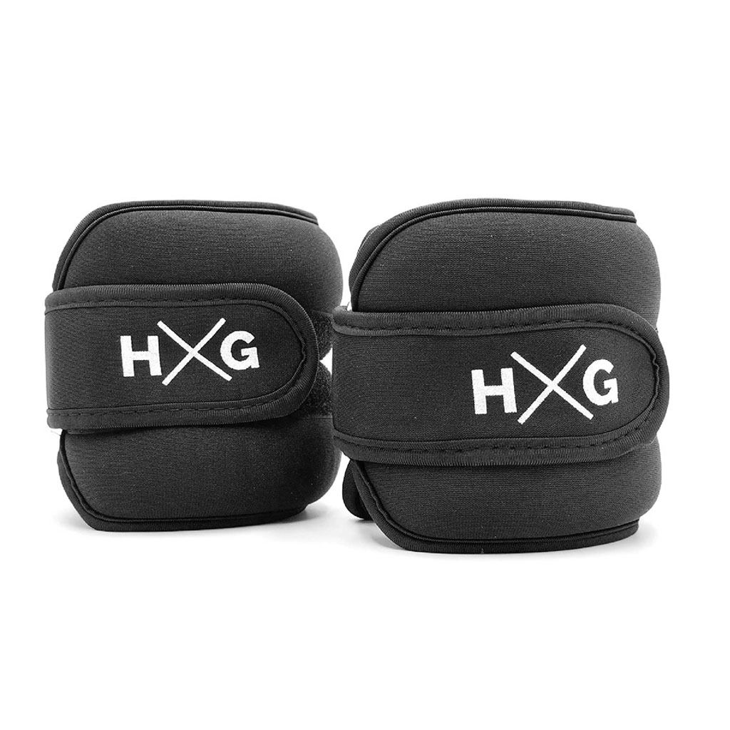 Dos pesas de muñeca negras con logo HXG blanco están una al lado de la otra.