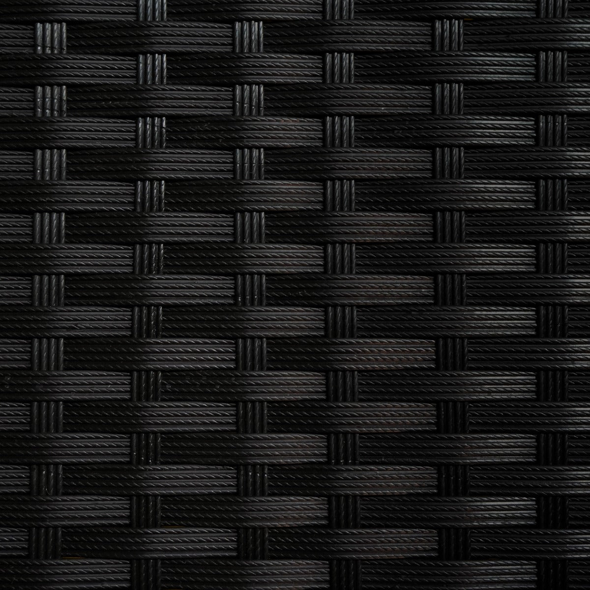 Un patrón negro tejido con bandas horizontales y verticales.