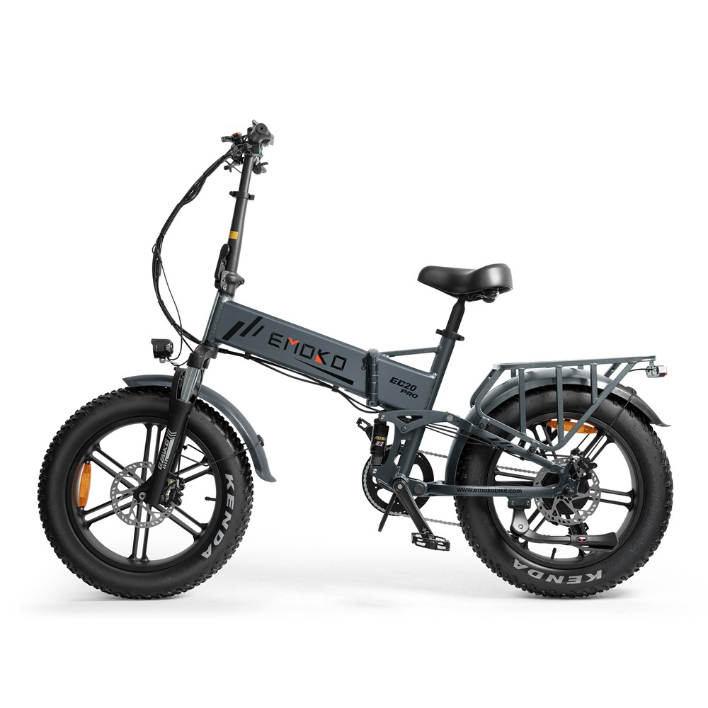 Bicicletta elettrica pieghevole grigia con pneumatici larghi e portapacchi posteriore.