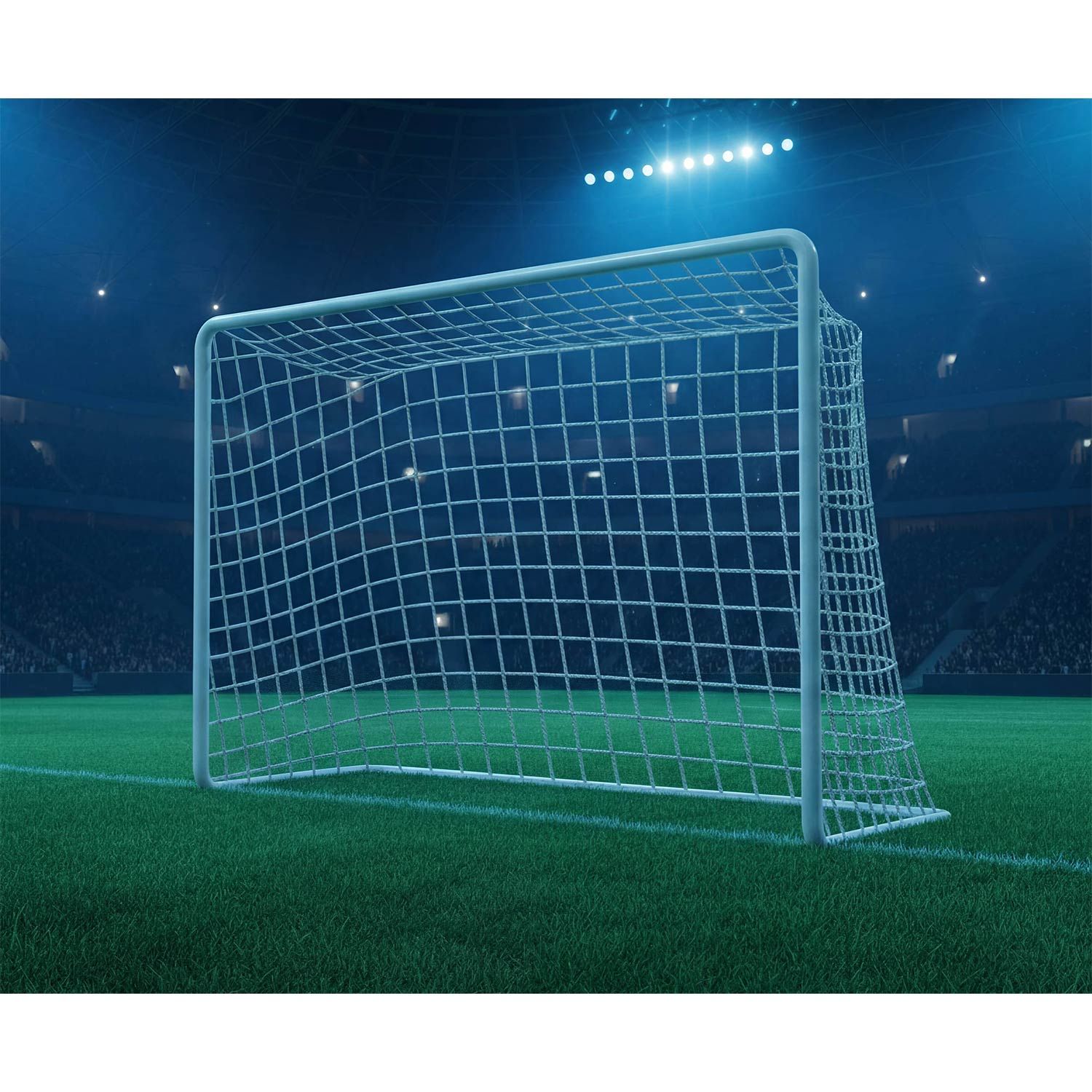 Bramka piłkarska na zielonym boisku z oświetleniem stadionu w tle.