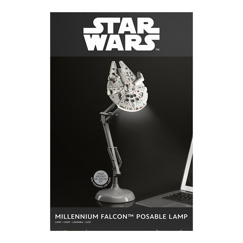 Lampa Star Wars Millennium Falcon z elastycznym ramieniem i światłem LED na biurku.