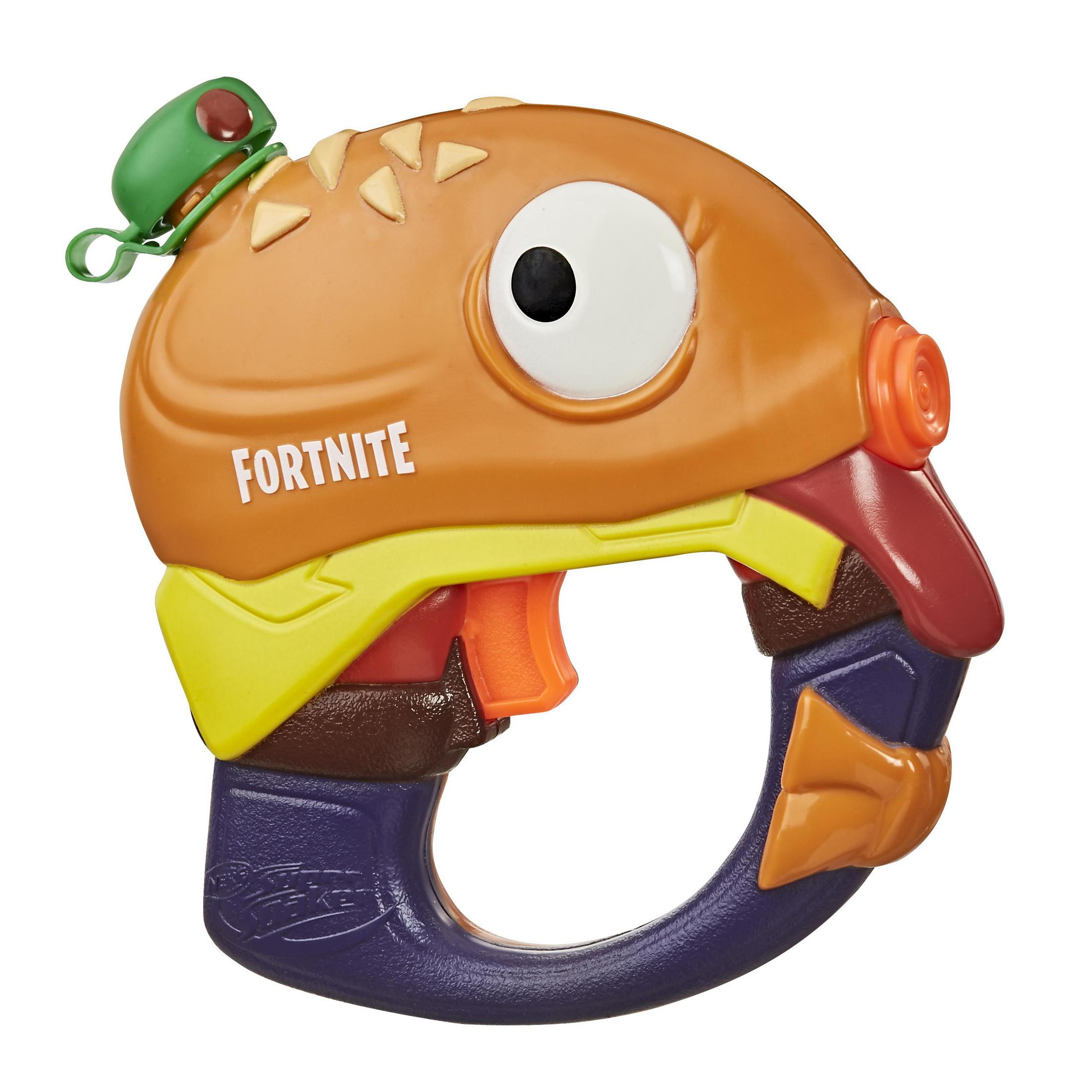 Una pistola giocattolo Fortnite a forma di hamburger, con un occhio e un coperchio verde.