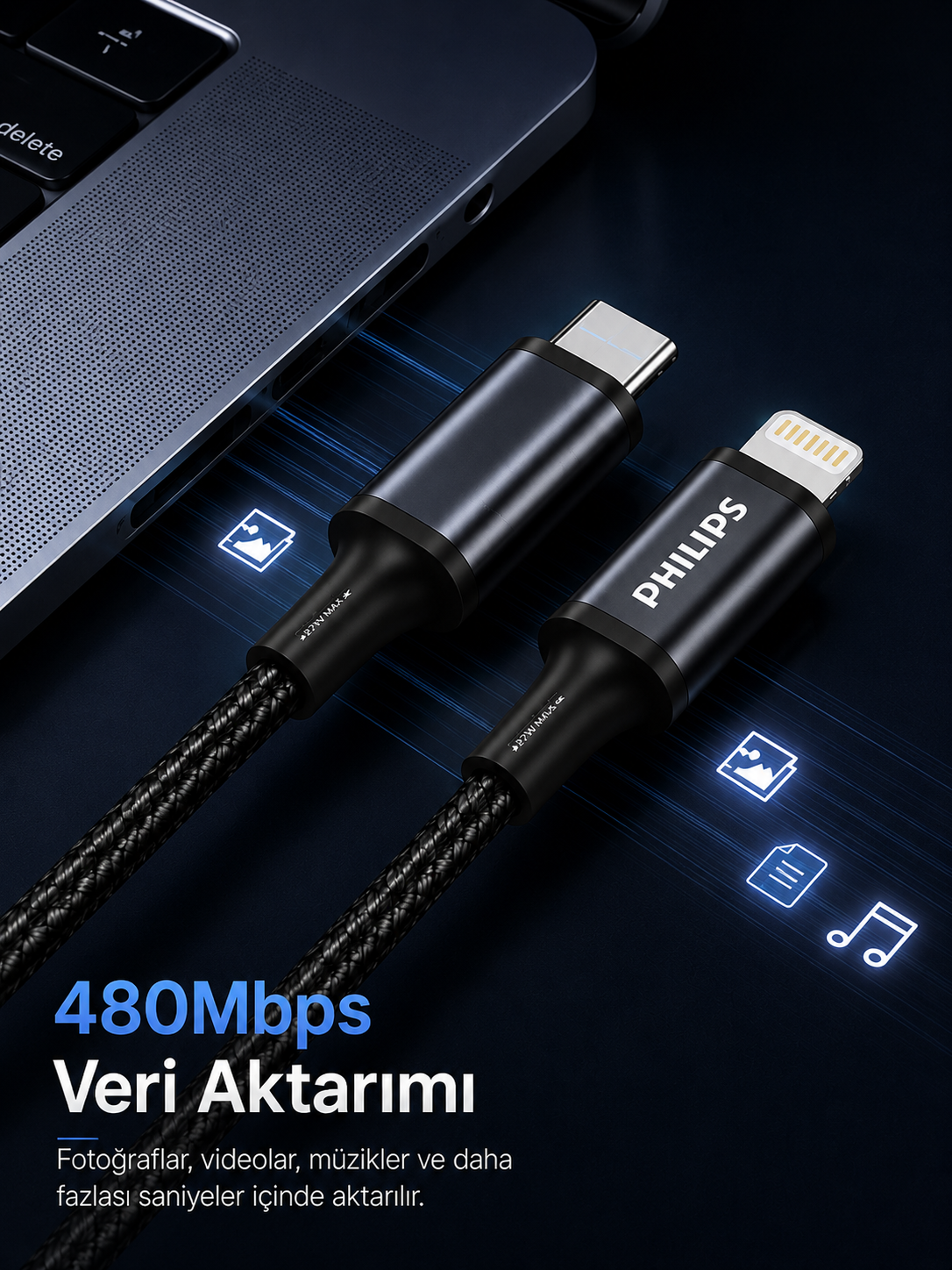 İki Philips şarj kablosu klavyenin üzerinde, konektörler yukarı bakıyor.