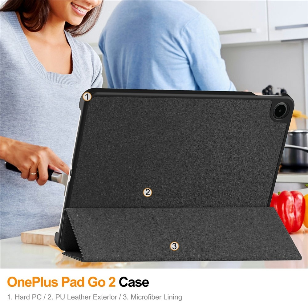 Black tablet with stand in a kitchen background.