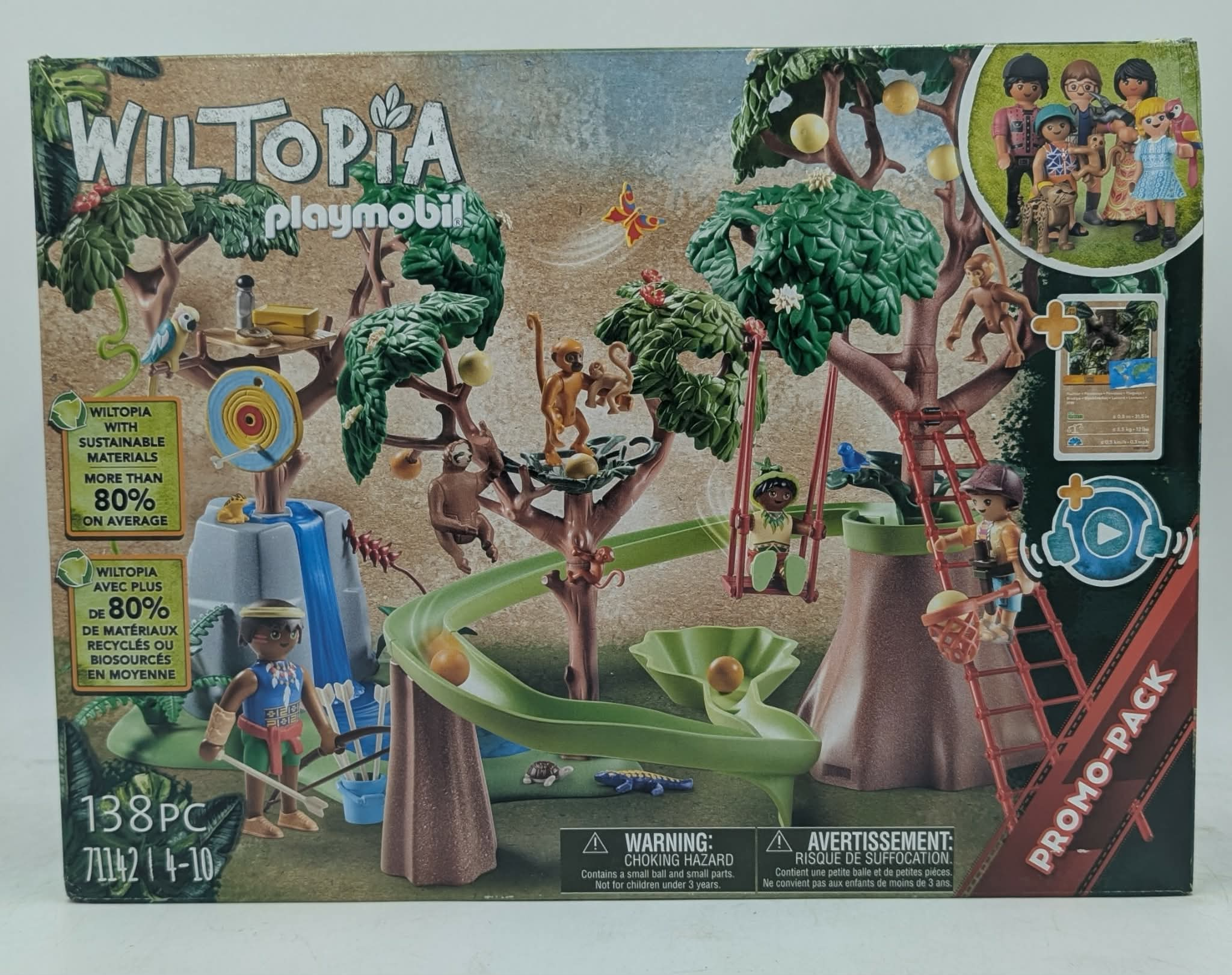 Playmobil Wiltopia Spielzeugbox mit Bäumen, Affen, Figuren, Rutsche und Warnhinweisen.