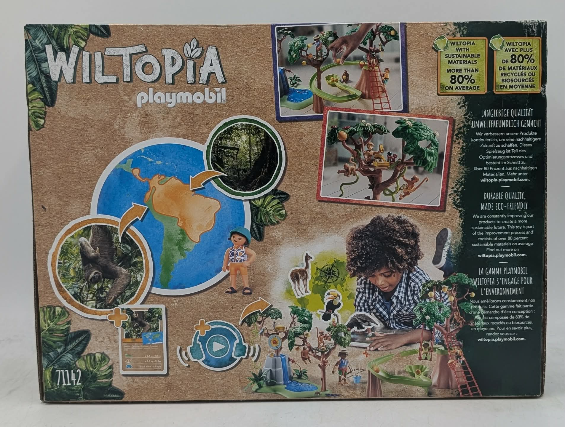 Playmobil Wiltopia Spielzeugverpackung mit Weltkarte, Tieren und Kindern.