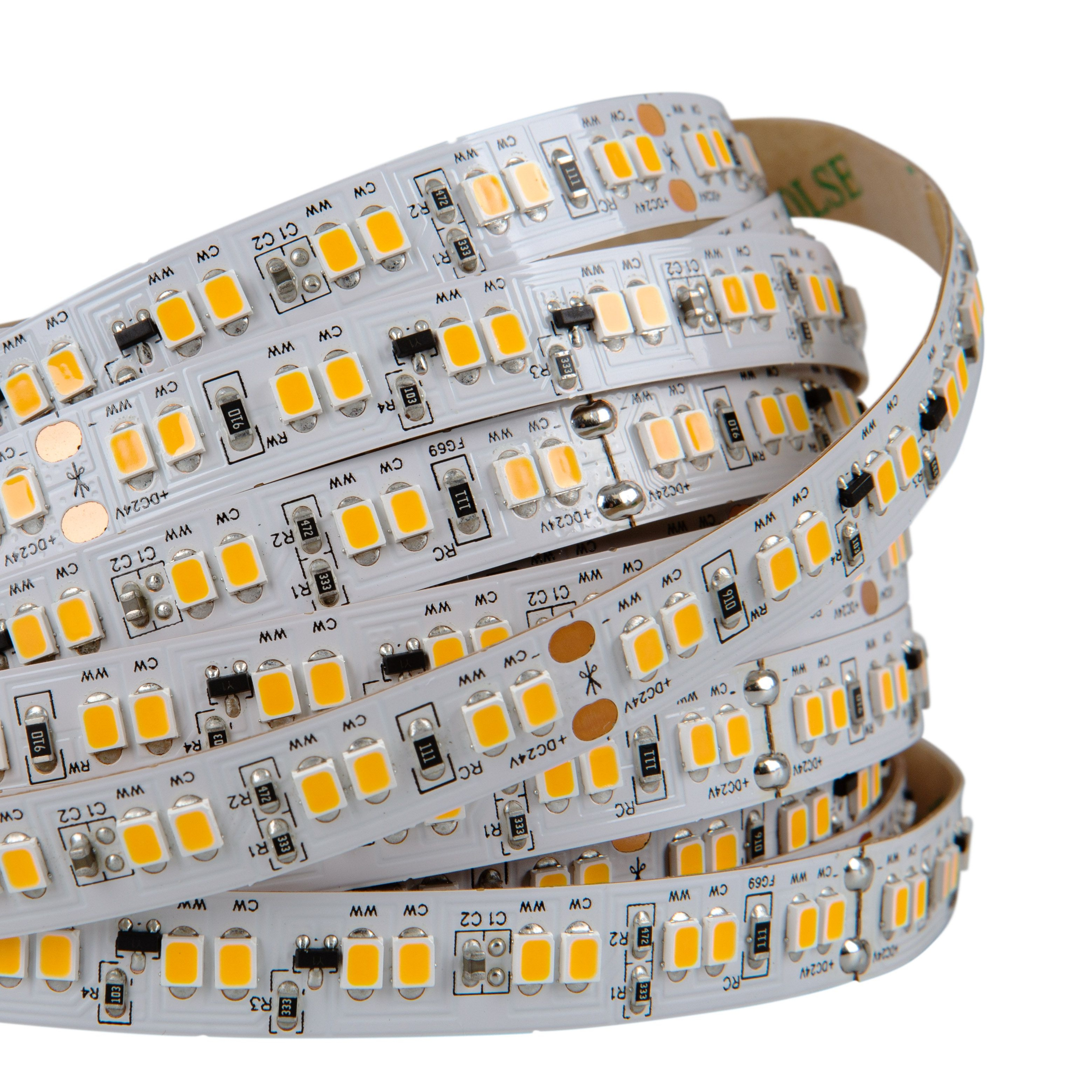 Eine aufgerollte LED-Streifenrolle mit gelben LEDs und Leiterplattenkomponenten.
